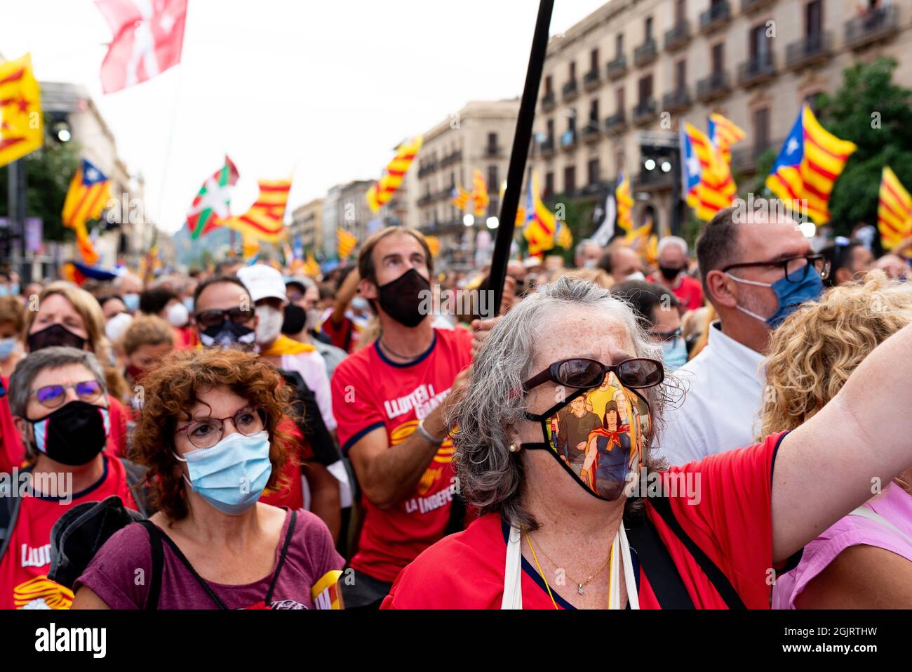 Esp. 11th Sep, 2021. A woman is seen close up during the celebrations and marches hold for the catalan holiday known as 'Diada' in Barcelona, Spain on September 11, 2021. Pro independence and catalan separatists parties such as ANC called for people to take the street in the first major concentration since the covid pandemic began, to remember the fall of Barcelona during the War of the Spanish Succession in 1714. (Photo by Davide Bonaldo/Sipa USA) Credit: Sipa USA/Alamy Live News Stock Photo