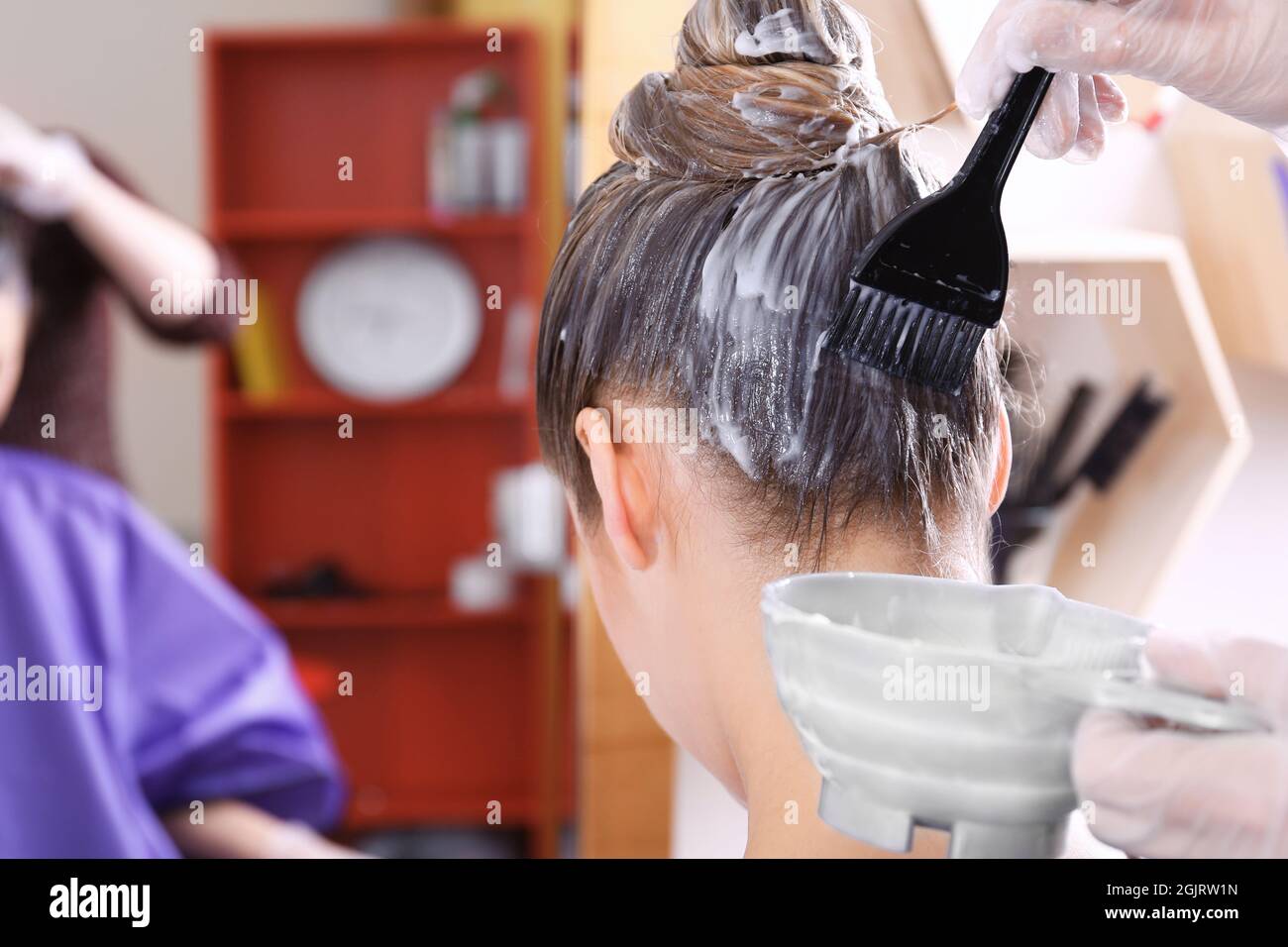 Process of dyeing hair at beauty salon Stock Photo Alamy