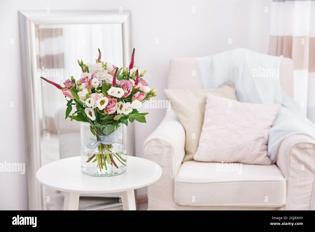Interior design of room with beautiful flowers Stock Photo - Alamy