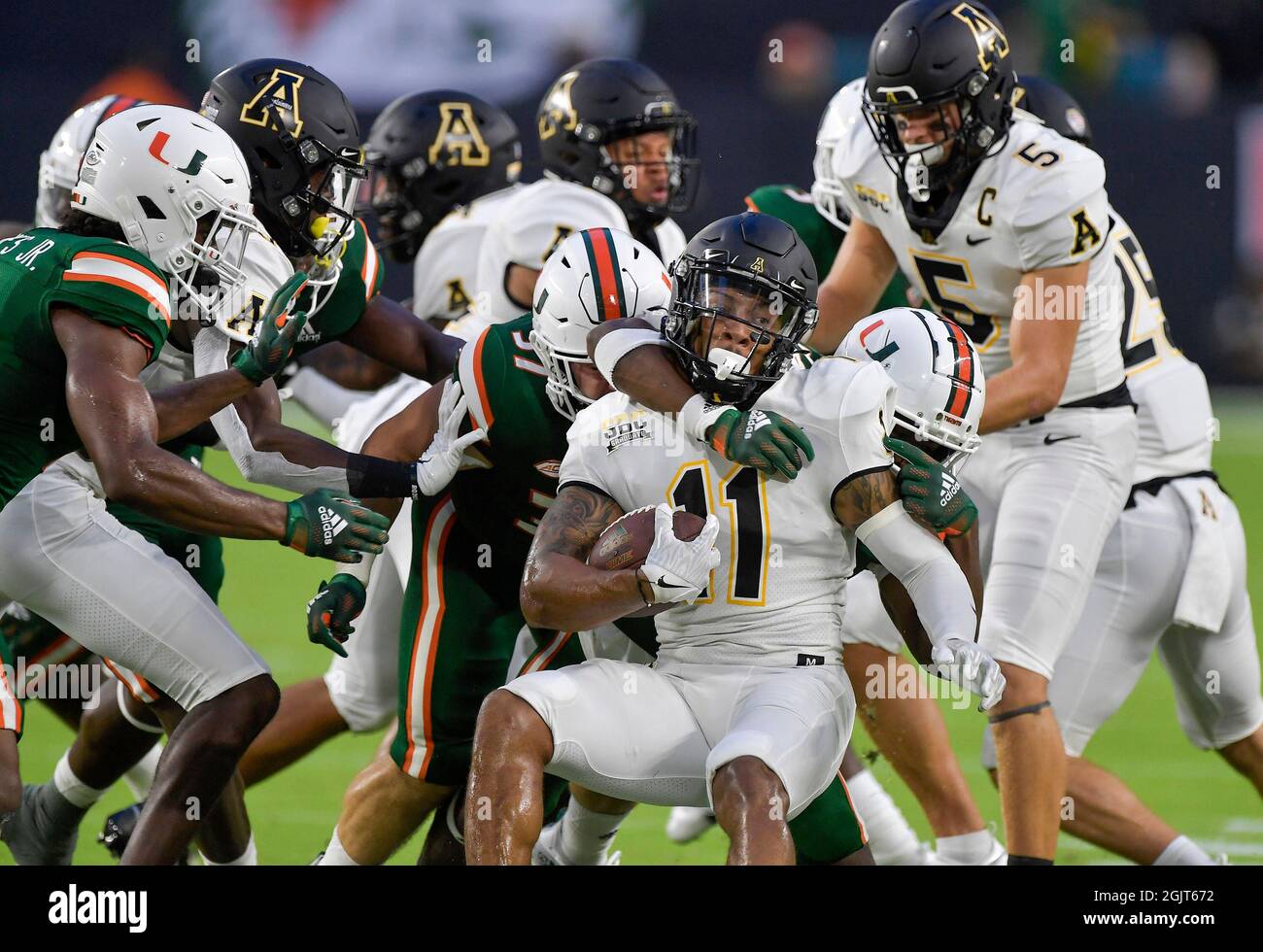 Miami Gardens, United States. 11th Sep, 2021. Appalachian State receiver Jalen Virgil (11) is stopped by the Miami defense during the first half at Hard Rock Stadium in Miami Gardens, Fla., on Saturday, Sept. 11, 2021. The host Hurricanes won, 25-23. (Photo by Michael Laughlin/South Florida Sun Sentinel/TNS/Sipa USA) Credit: Sipa USA/Alamy Live News Stock Photo