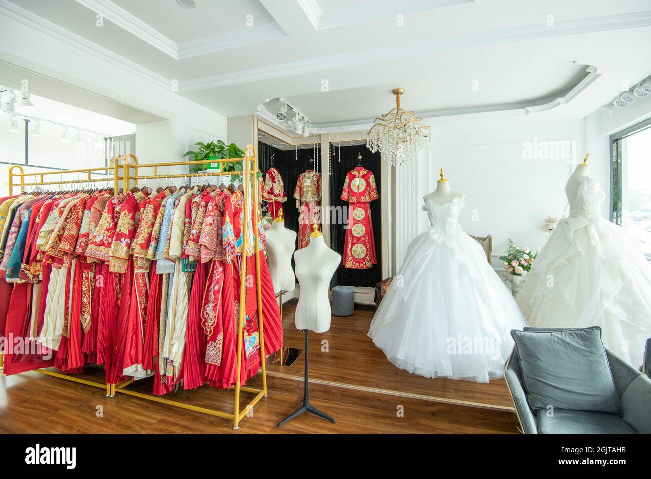 dress on hangers in a shop Stock Photo Alamy