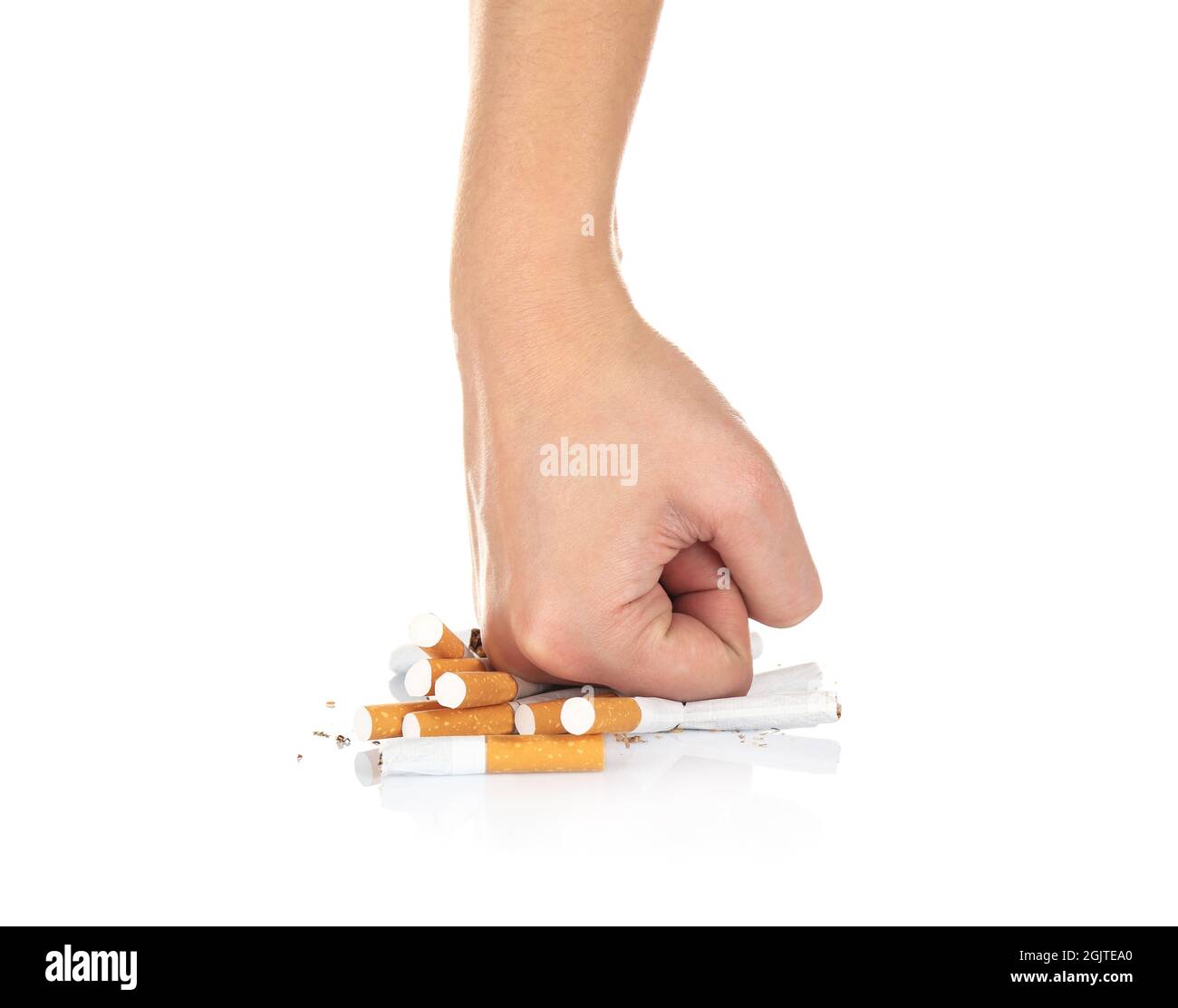 Human hand crushing cigarettes on white background Stock Photo Alamy