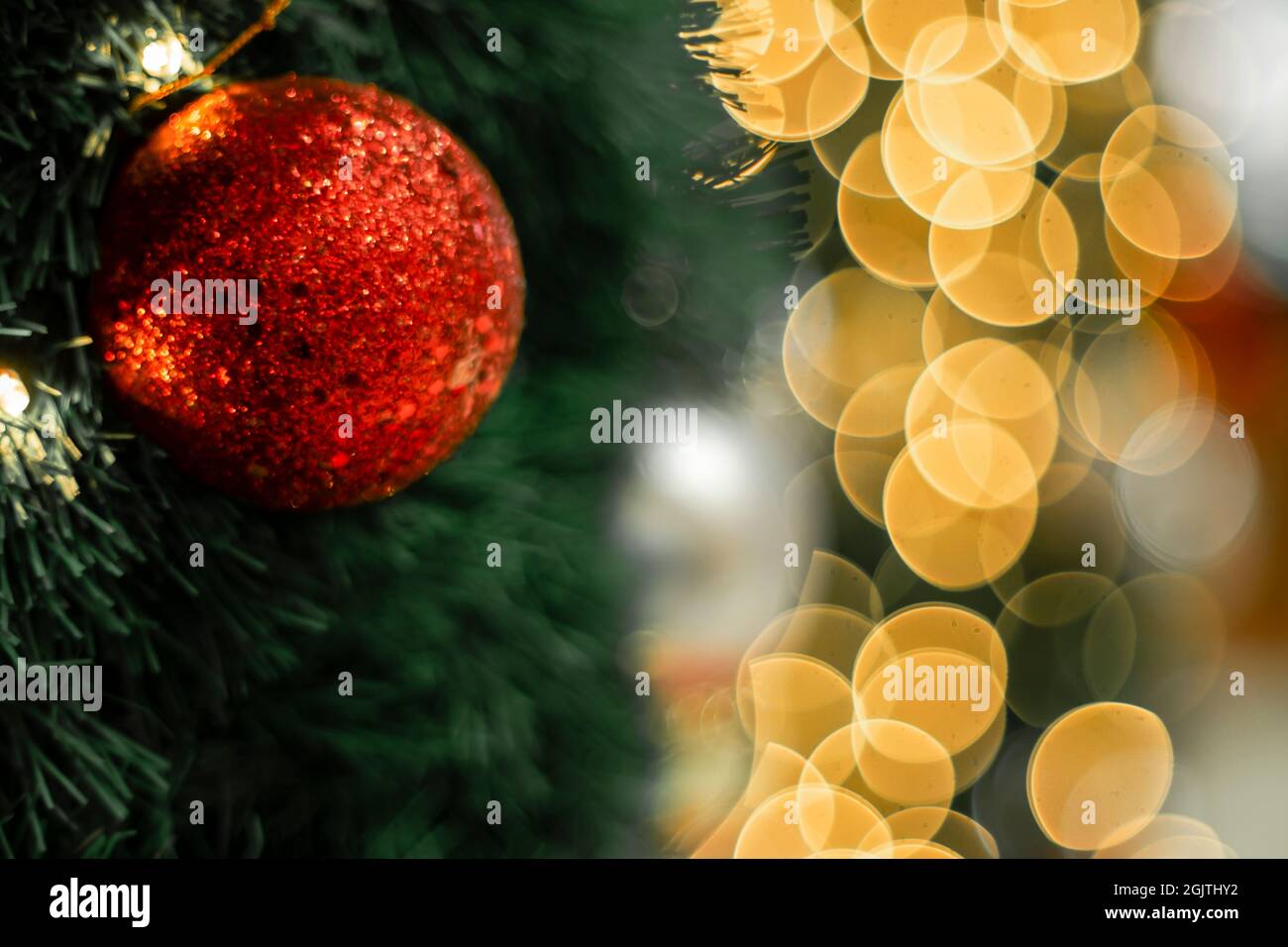 Christmas Tree red Ball And gold Bokeh Background Stock Photo - Alamy