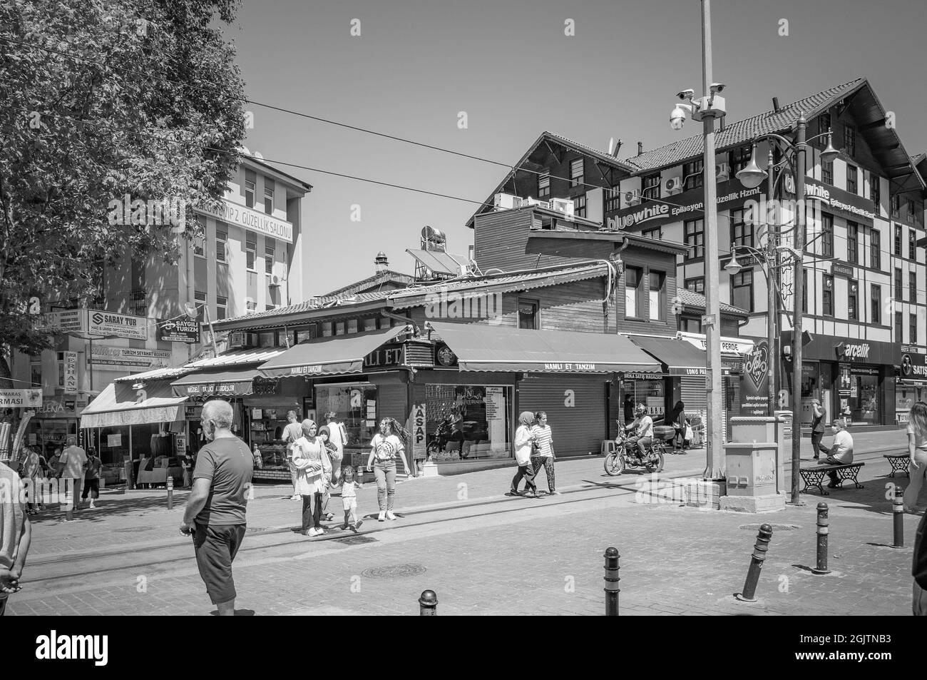 BURSA, TURKEY. AUGUST 15, 2021. Street view, A lot of people on the square. Small shops and cafe. Stock Photo