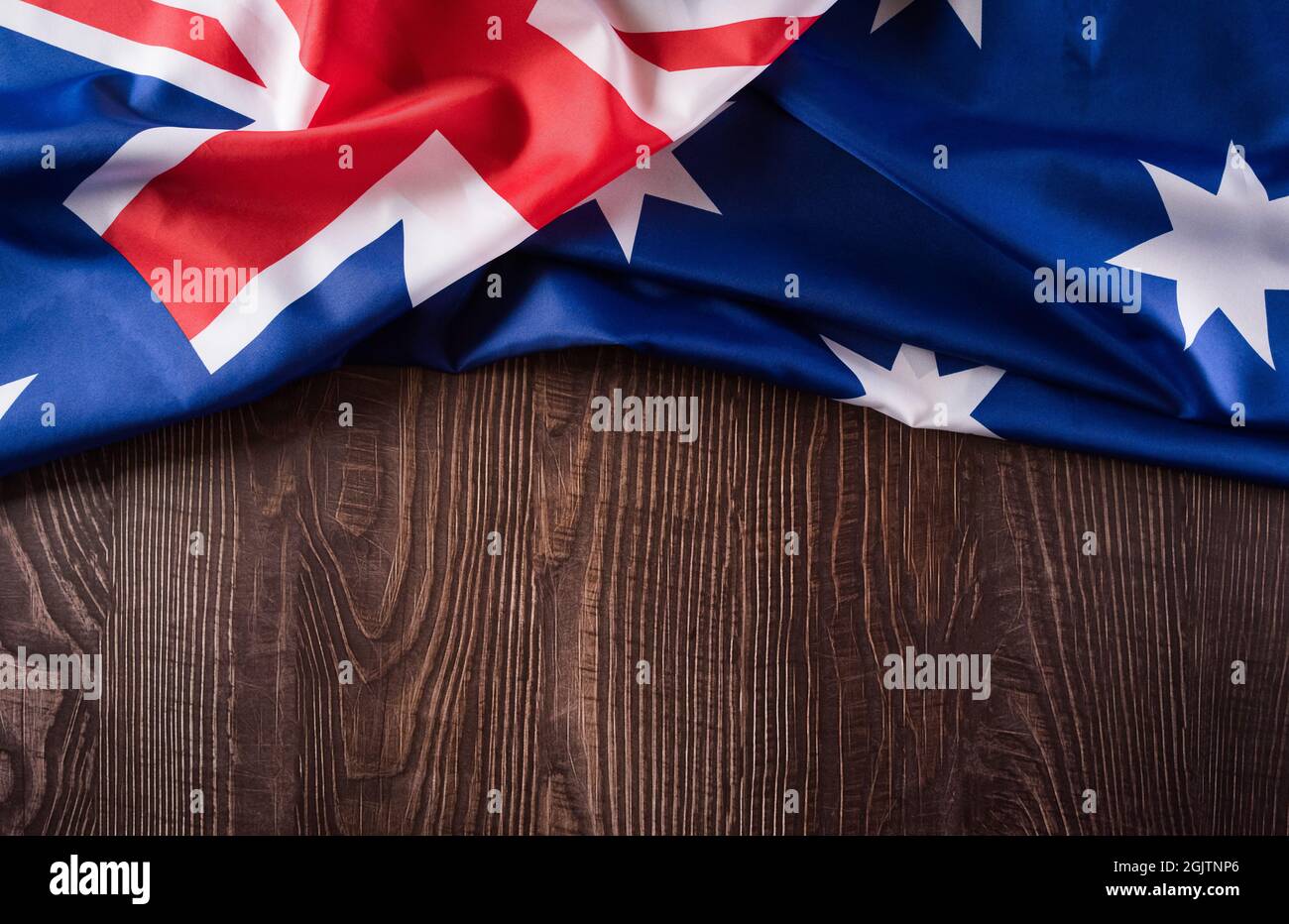 Happy Australia day concept. Australian flag against old wooden background. 26 January - Alamy