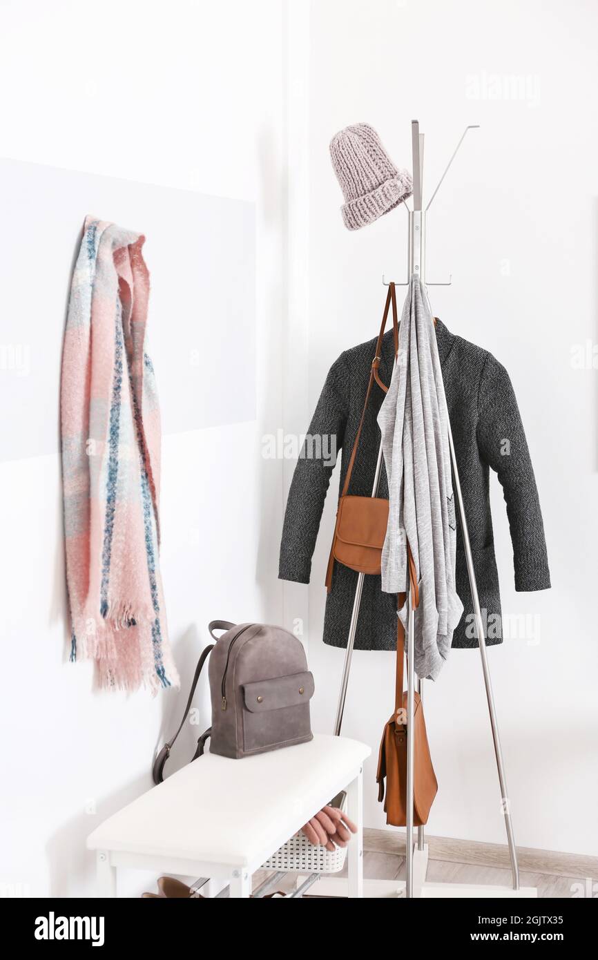 Modern hall interior with hanging clothes Stock Photo - Alamy