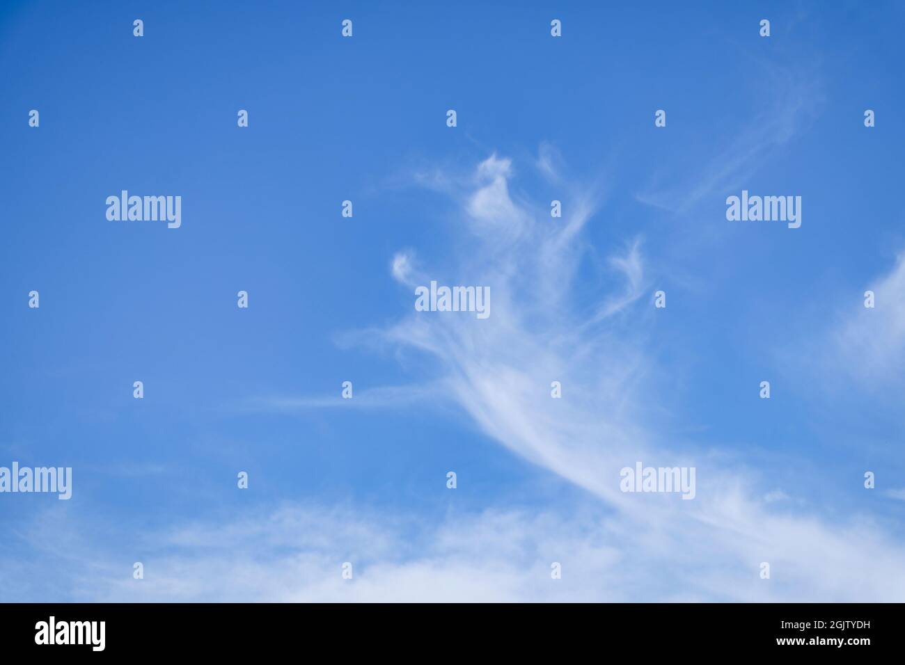 Cirrostratus cloud in the shape of a skeletal hand Stock Photo