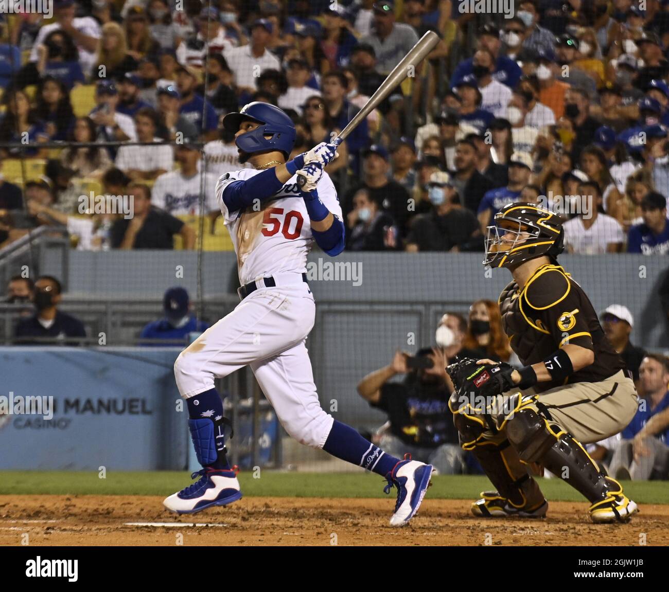 Los Angeles, United States. 12th Sep, 2021. Los Angeles Dodgers' Mookie Betts hits a three-run home run off San Diego Padres' reliever Craig Stammen in the fifth inning at Dodger Stadium in Los Angeles on Saturday, September 11, 2021. Photo by Jim Ruymen/UPI Credit: UPI/Alamy Live News Stock Photo