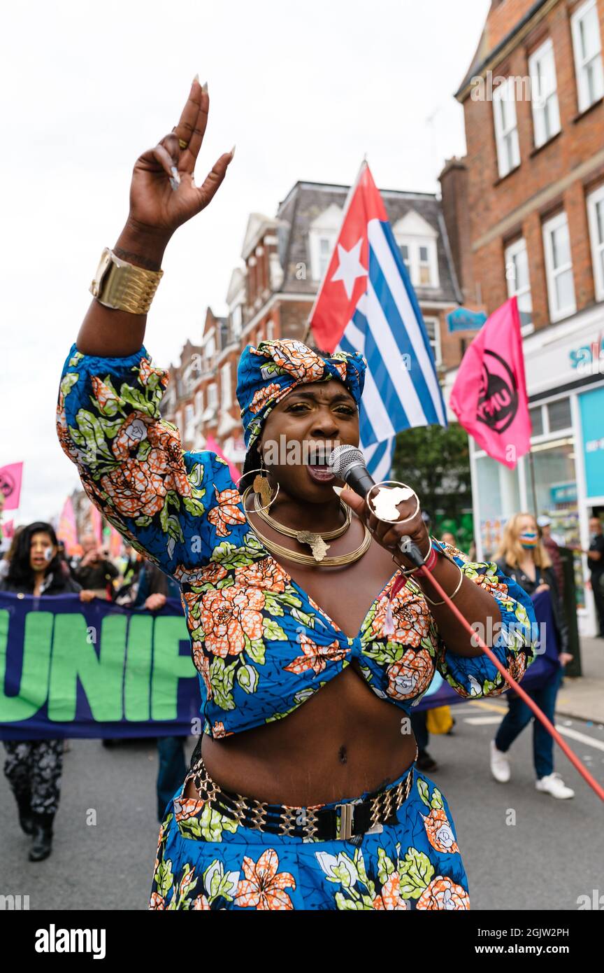 London, UK. 29 August 2021. Extinction Rebellion and XR Unify supporters march to the 'Carnival for Climate Justice' event in Finsbury Park. Stock Photo
