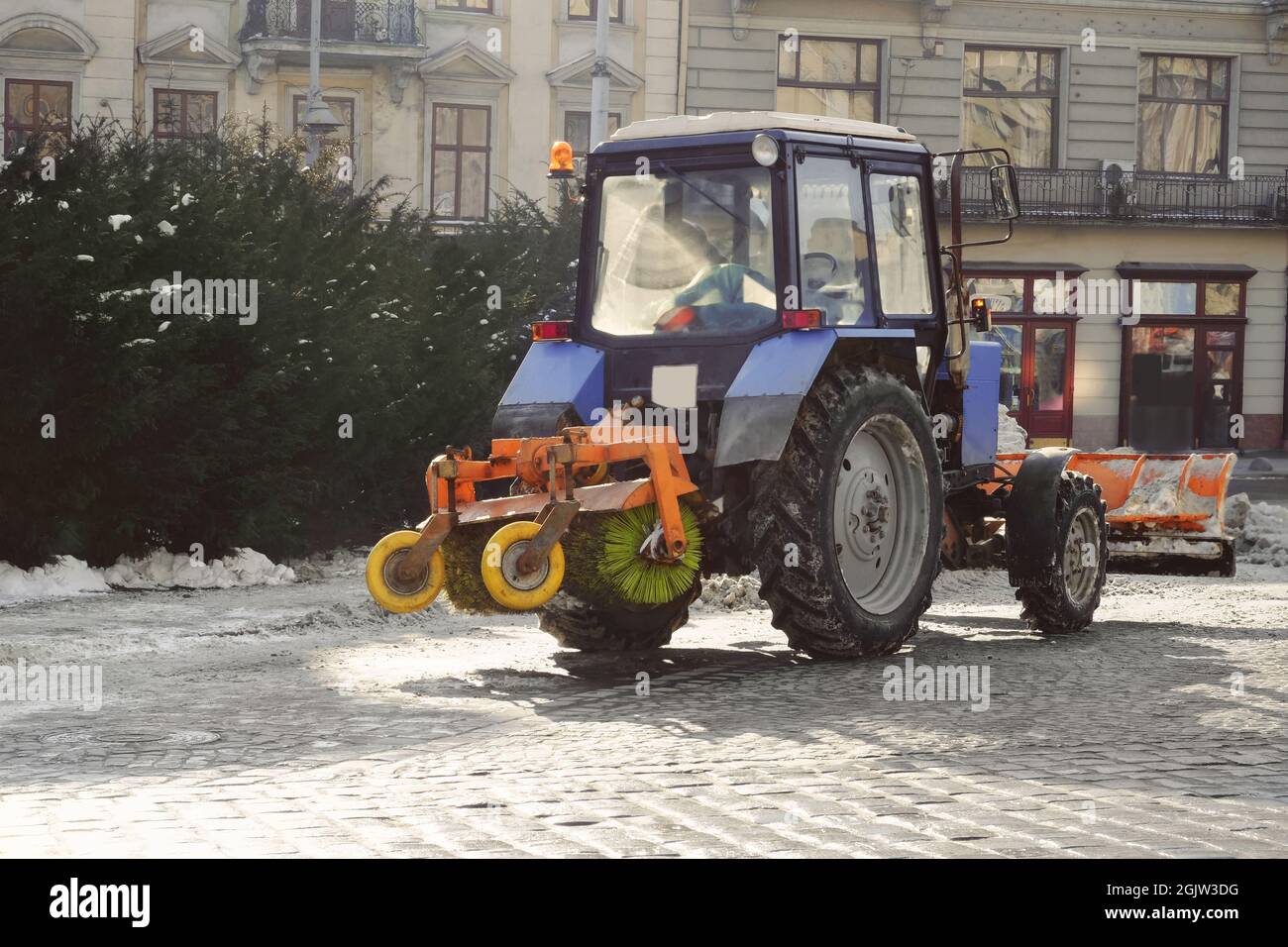 Snow plow at work on city street Stock Photo Alamy