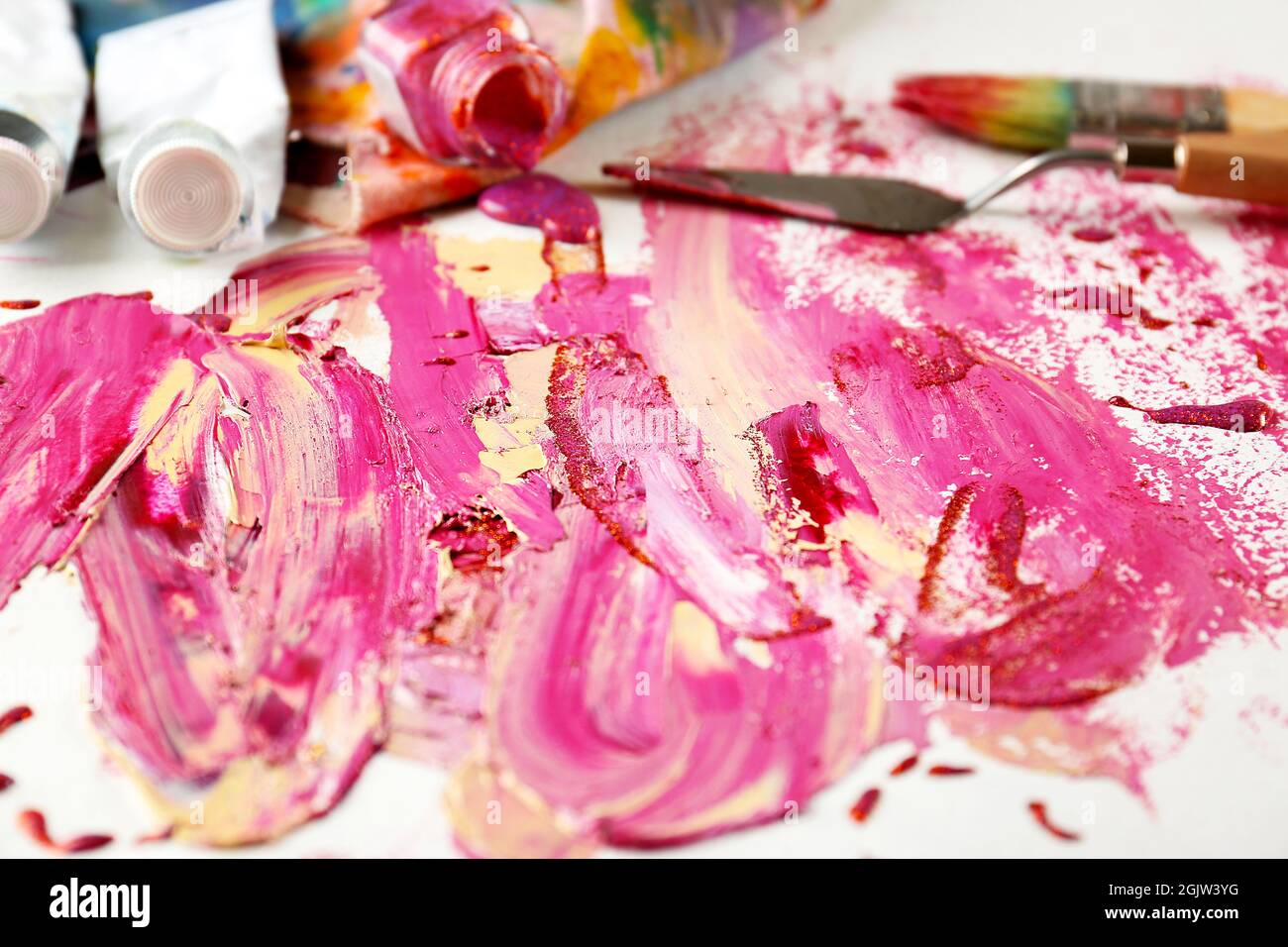 Artist supplies and accessories with paint on paper Stock Photo Alamy