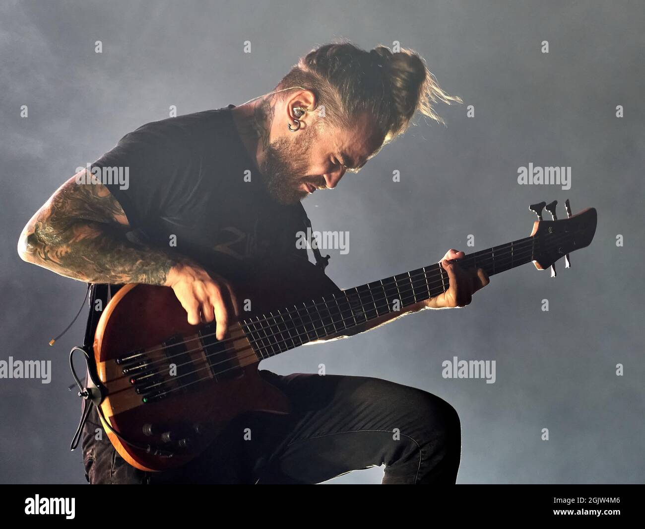 Eugene Abdukhanov of Jinjer band plays a bass guitar live on stage at the  1930 Moscow. (Photo by Mihail Siergiejevicz / SOPA Imag/Sipa USA Stock  Photo - Alamy