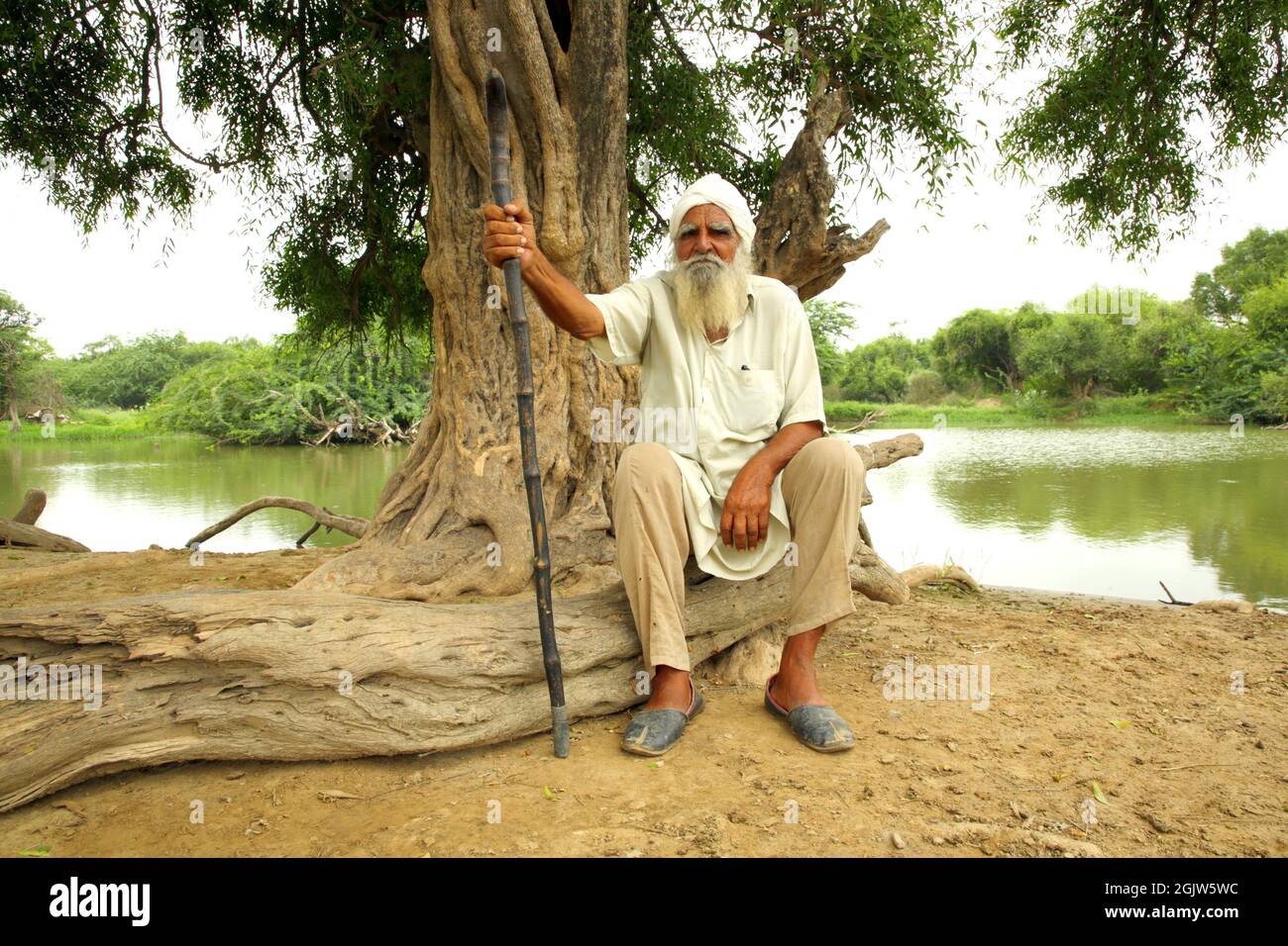 Old Sikh man in Indian village Stock Photo