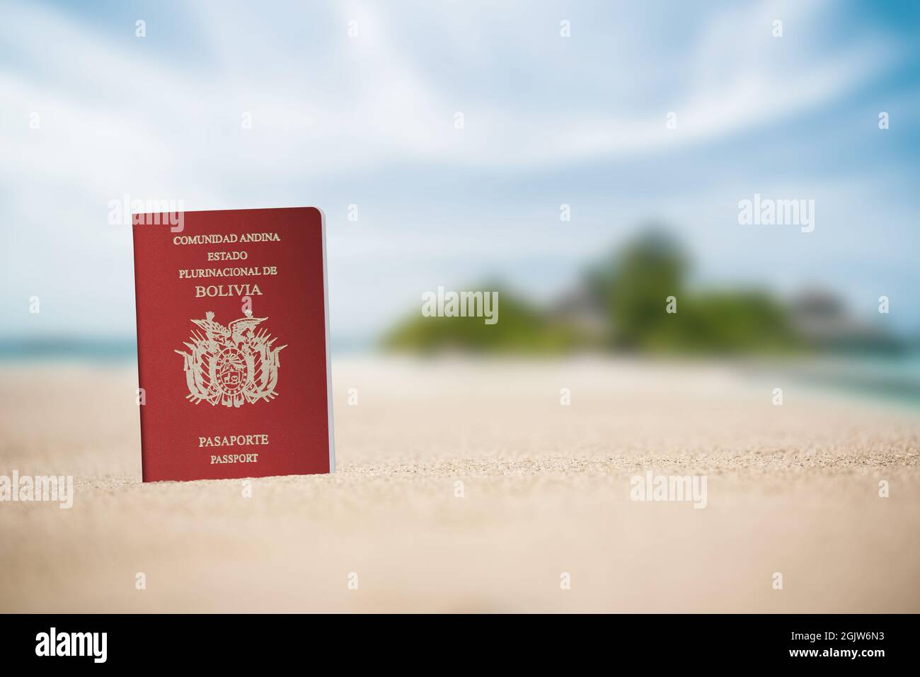 The Bolivian passport is the official travel document issued to citizens of Bolivia by the Bolivian Government ,A passport on the sand of the beach Stock Photo