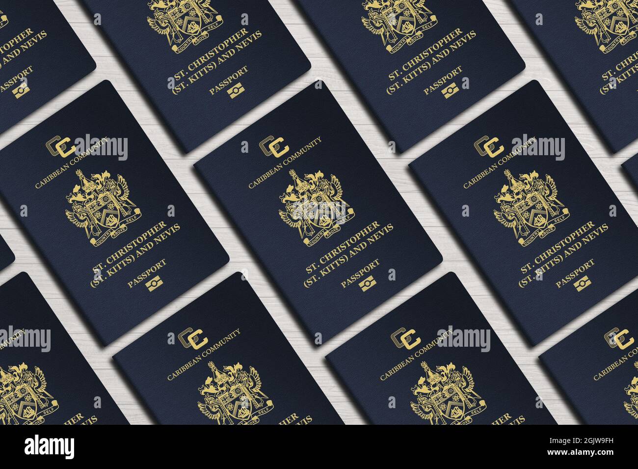 Passports of the Caribbean state of Saint Kitts and Nevis, top view, on a wooden table Stock Photo