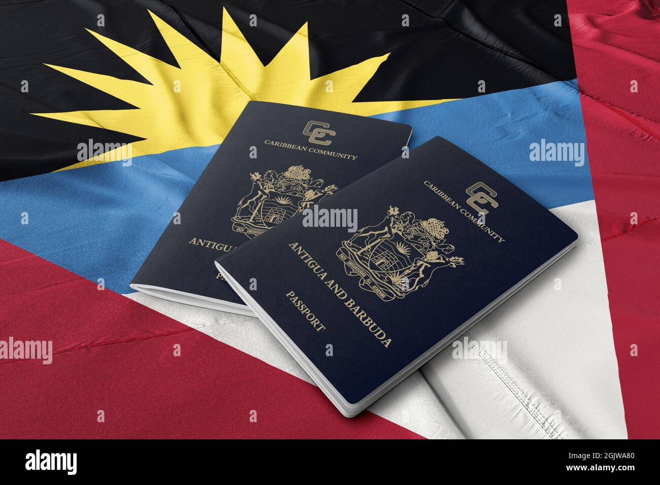 Antigua and Barbuda passport travel on its flag, top view Stock Photo