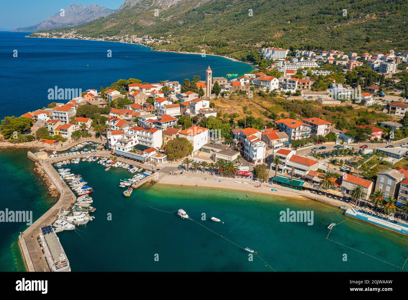 Aerial view of Gradac town below Biokovo mountain, the Adriatic Sea, Croatia Stock Photo