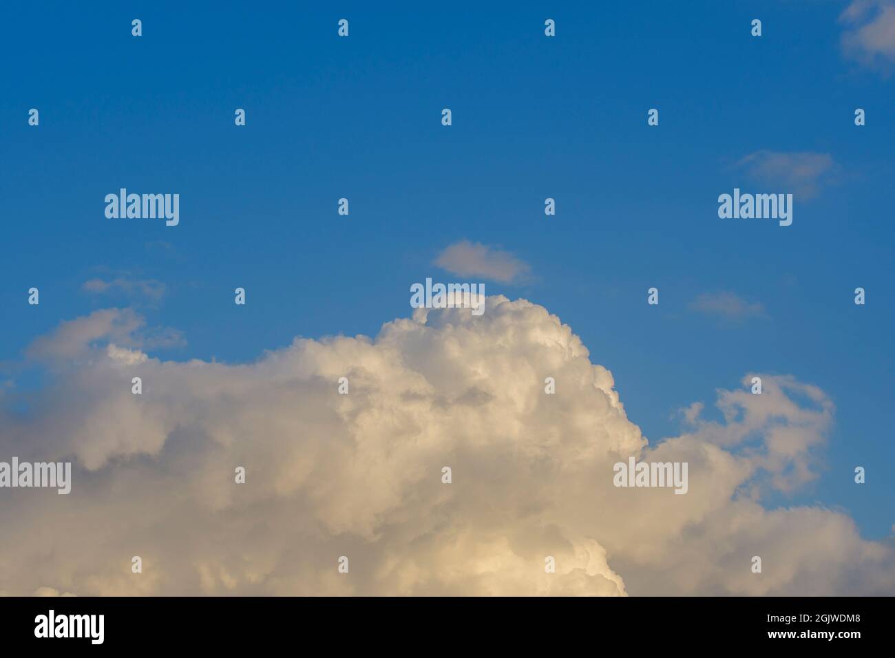 Blue sky above a large cloud Stock Photo