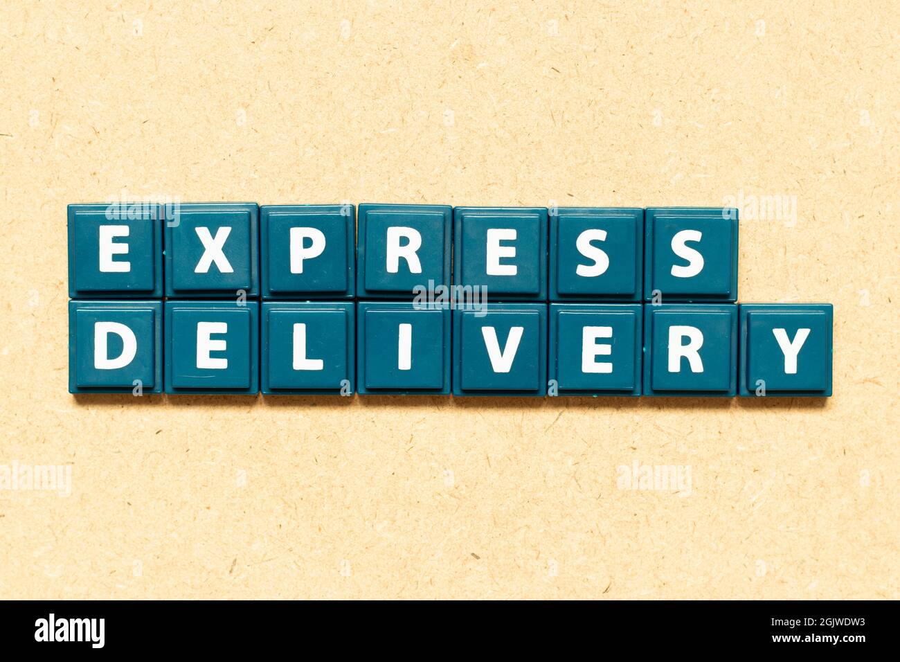 Tile alphabet letter in word express delivery on wood background Stock ...