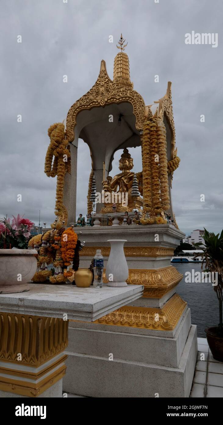 Buddhist Shrine Chinese gods along the Chao Phraya River Chinatown Bangkok Thailand Stock Photo