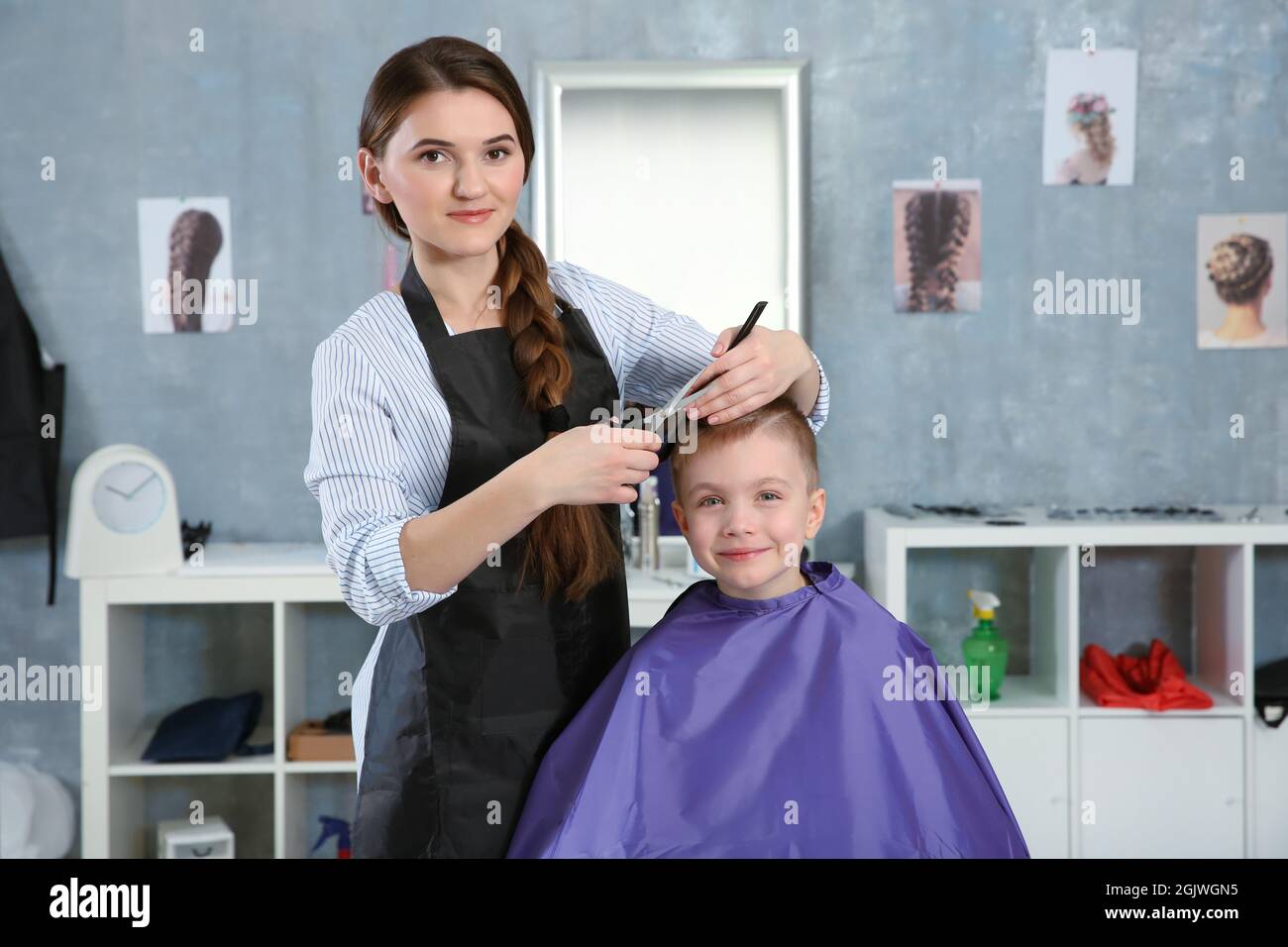 Cute little boy in hairdressing salon Stock Photo Alamy