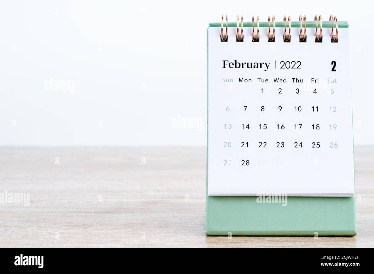 February 2022 Desk Calendar On Wooden Table Stock Photo - Alamy