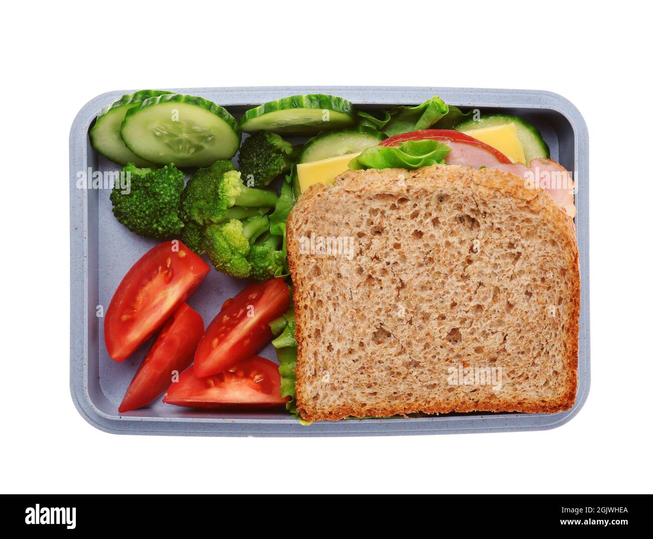 Lunch box with delicious food on white background Stock Photo - Alamy