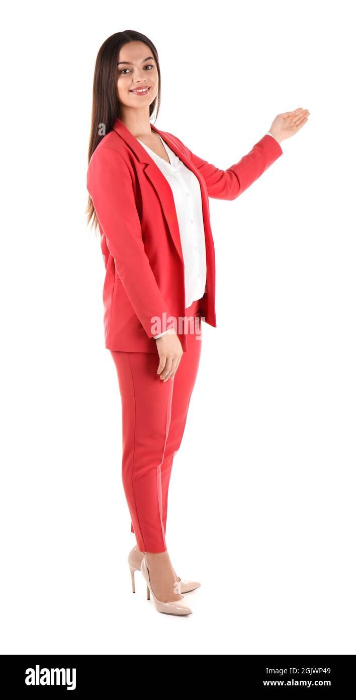 Beautiful young business woman standing on white background Stock Photo ...