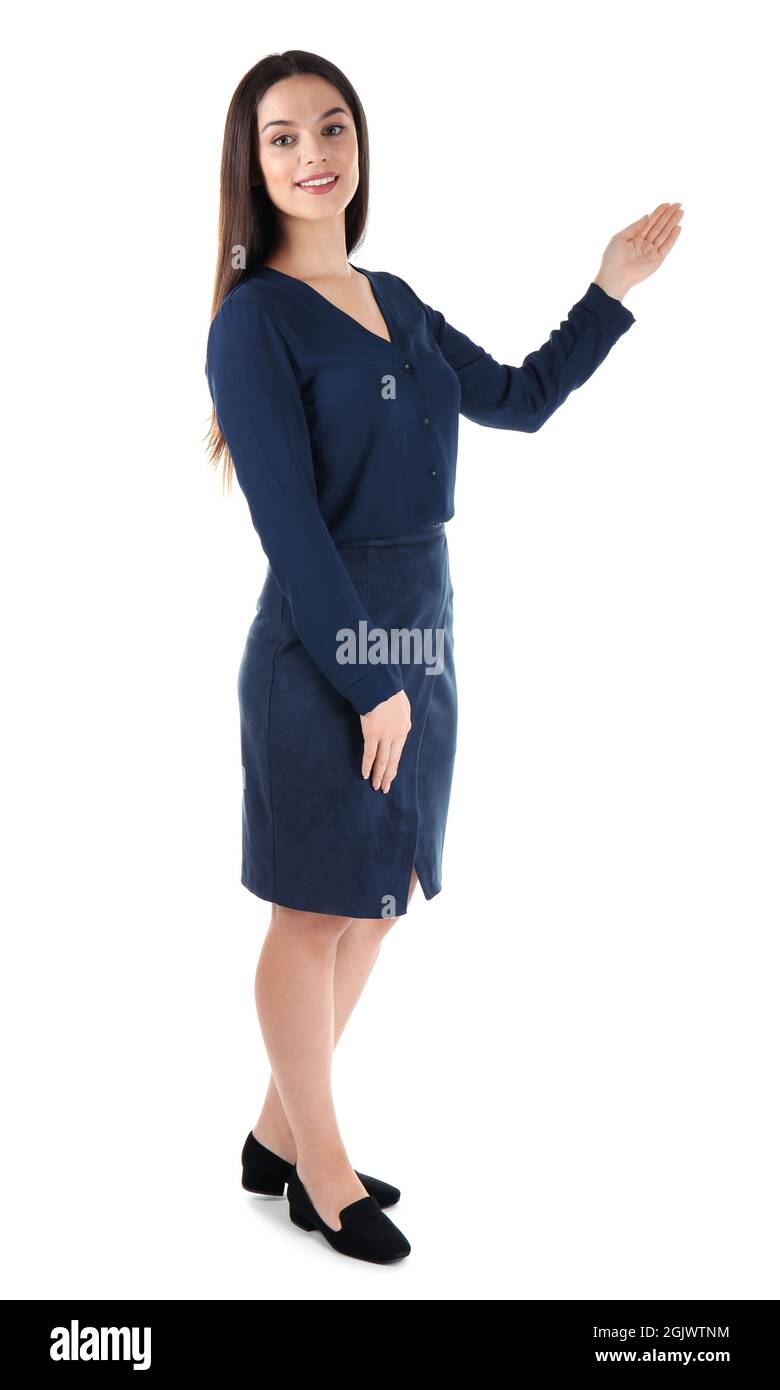 Beautiful young business woman standing on white background Stock Photo ...