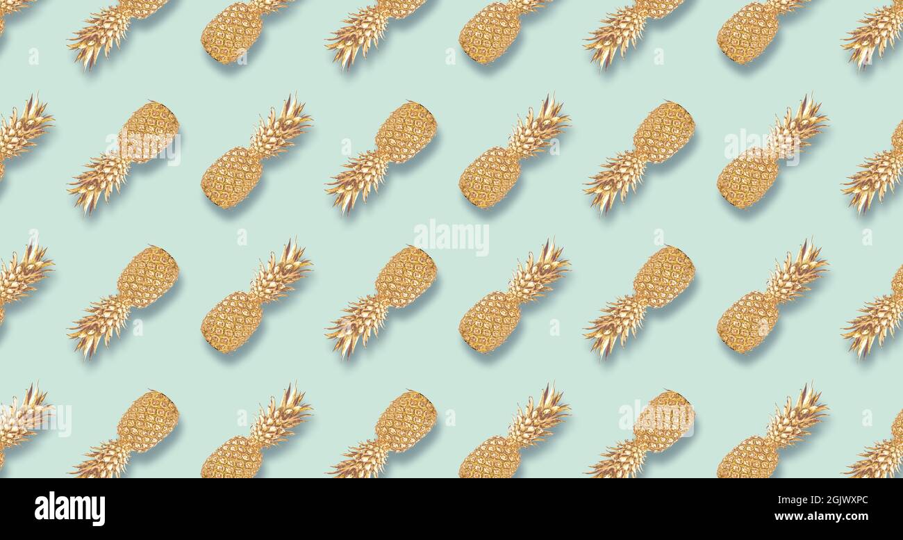 Seamless summer gold pineapple on striped background. Seamless pattern Stock Photo
