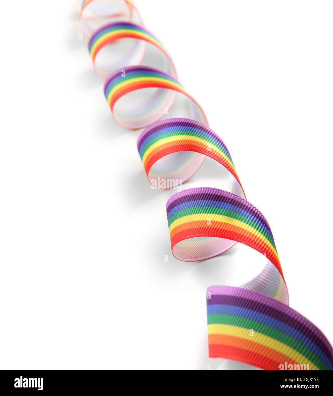 Rainbow ribbon on white background Stock Photo - Alamy