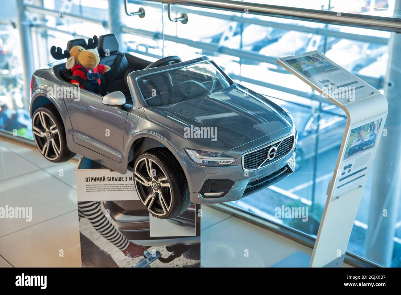 KYIV, UKRAINE - MAY 10, 2021: Baby car Volvo indoors on display in Winner Center dealership company. The Volvo Group is a Swedish multinational manufa Stock Photo