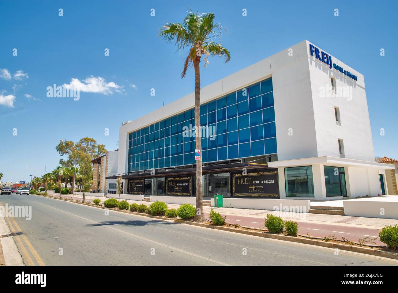 AYIA NAPA, CYPRUS - MAY 23, 2021: Summer sunny Nissi Avenue and Freij Hotel and Resort in city center. Ayia Napa is a tourist resort at the far easter Stock Photo