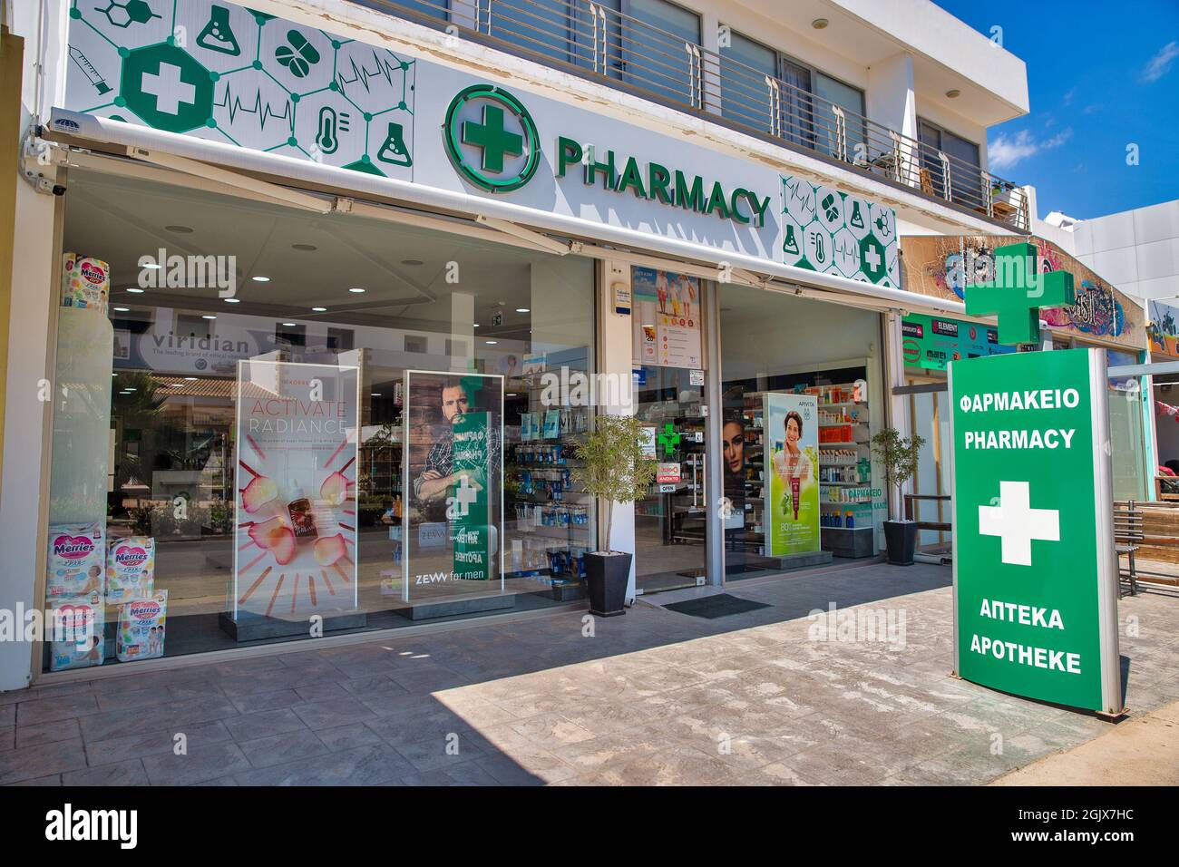 AYIA NAPA, CYPRUS - MAY 23, 2021: Pharmacy facade on summer sunny Nissi Avenue in city center. Ayia Napa is a tourist resort at the far eastern end of Stock Photo