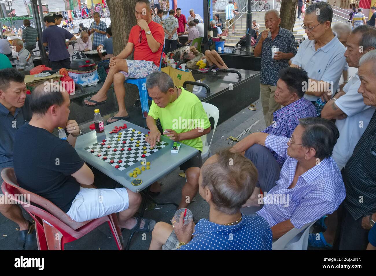 Elderly, retired ethnic Chinese men at Kreta Ayer Square, Chinatown ...