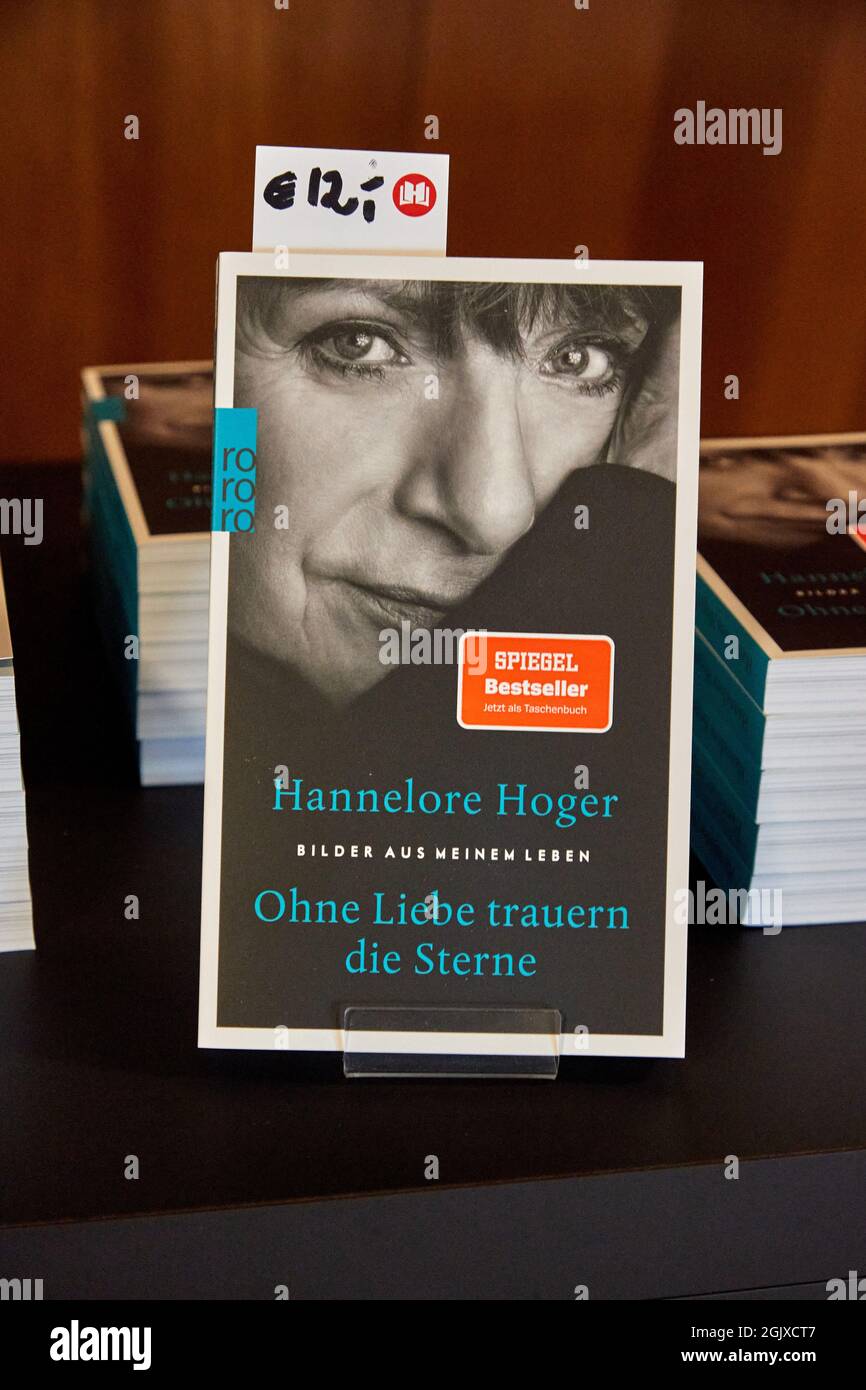 11 September 2021, Hamburg: The book 'Ohne Liebe trauern die Sterne - Bilder aus meinem Leben' by Hannelore Hoger, actress and author, is on display at a stand in the foyer of the Kleiner Saal in the Elbphilharmonie. Photo: Georg Wendt/dpa Stock Photo