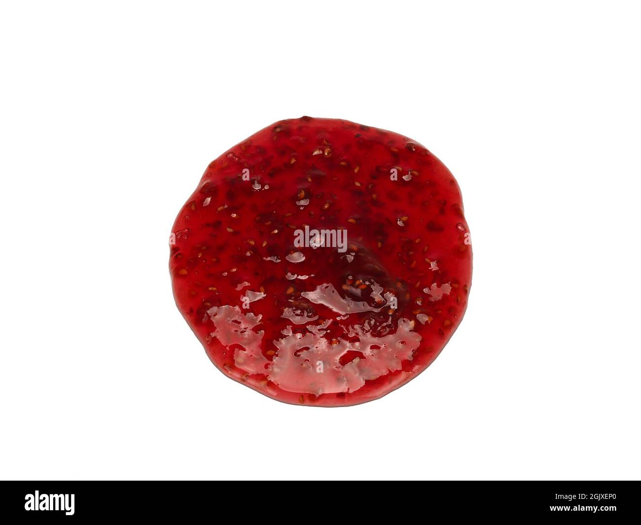 Round spot of raspberry jam isolated on white background from top view ...