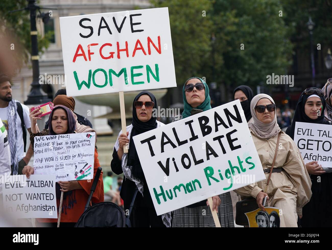 People at an Afghan solidarity rally in Trafalgar Square, London, to ...