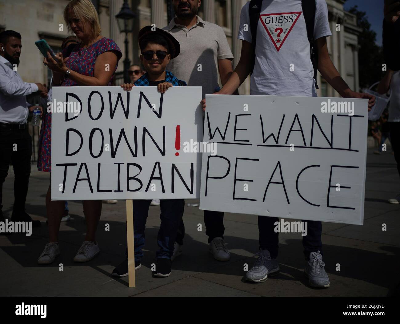 People at an Afghan solidarity rally in Trafalgar Square, London, to ...