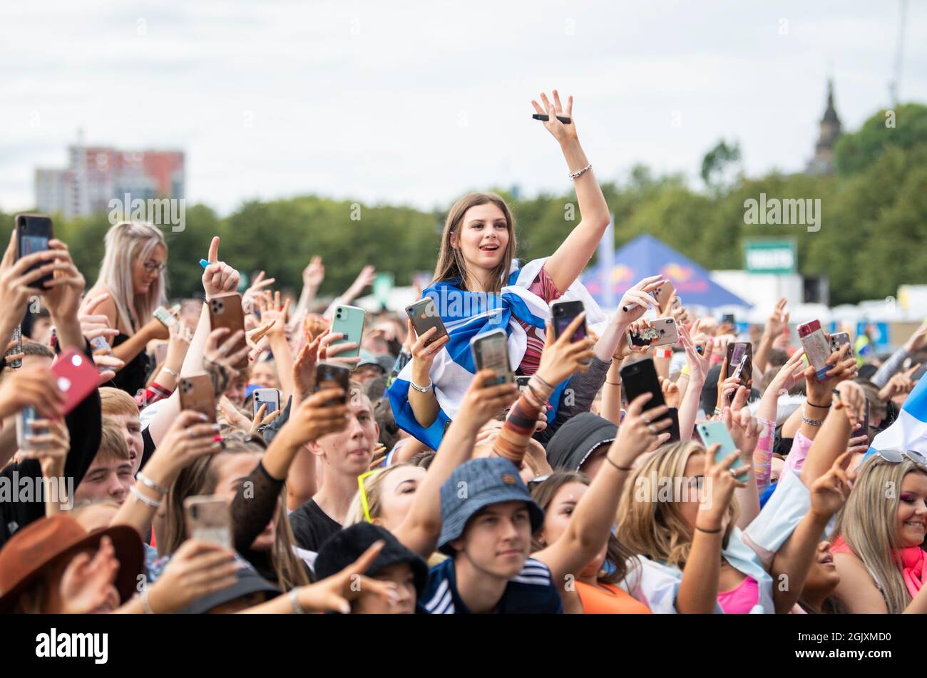 Revellers watch Jay1 performing at the TRNSMT Festival at Glasgow Green ...