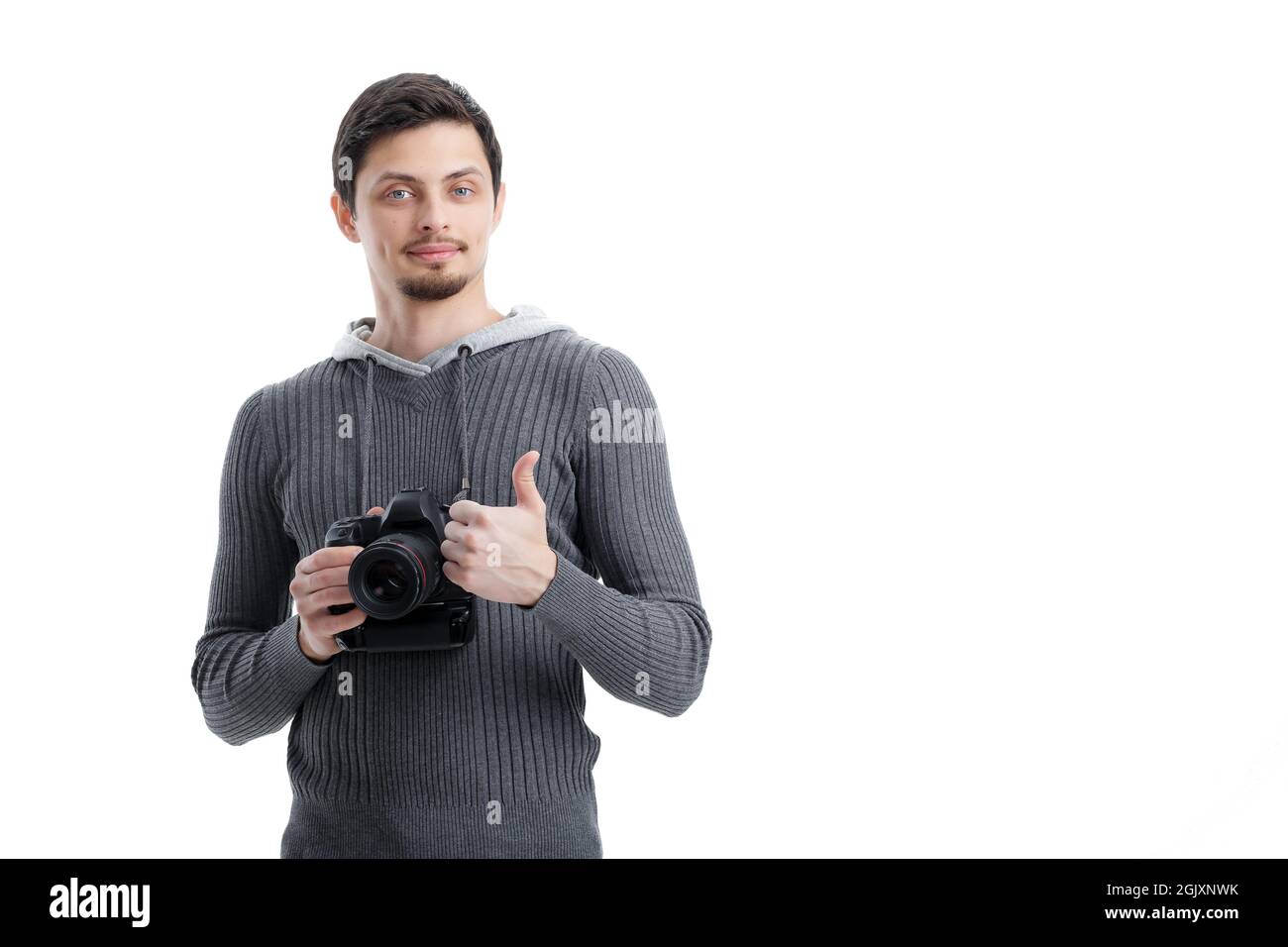 successful professional photographer use DSLR digital camera and Stock