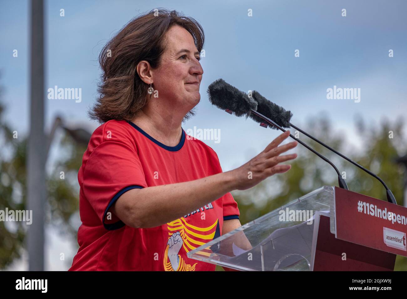 Elisenda Paluzie, president of the Catalan National Assembly, speaks on the stage at Avenida Marquès de l'Argentera.According to figures from the organizers, there are around 400,000 people, according to the Guàrdia Urbana, a little more than 100,000 who convened under the slogan 'Lluitem i Guanyem la indepència' (let's fight and win Independence) have attended the unitary demonstration to celebrate September 11, Diada of Catalonia. Stock Photo