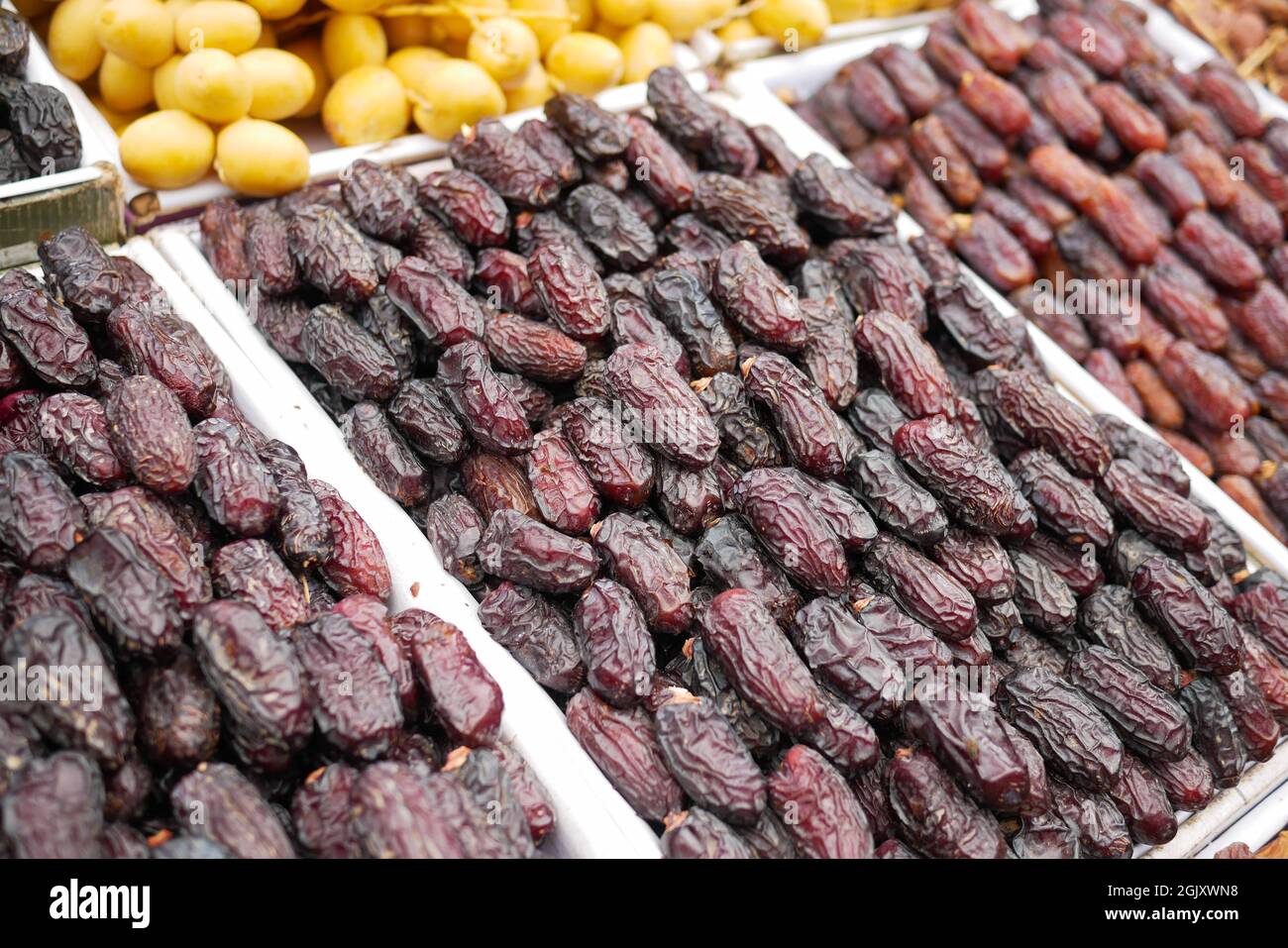 many date fruits display for sale at local market  Stock Photo