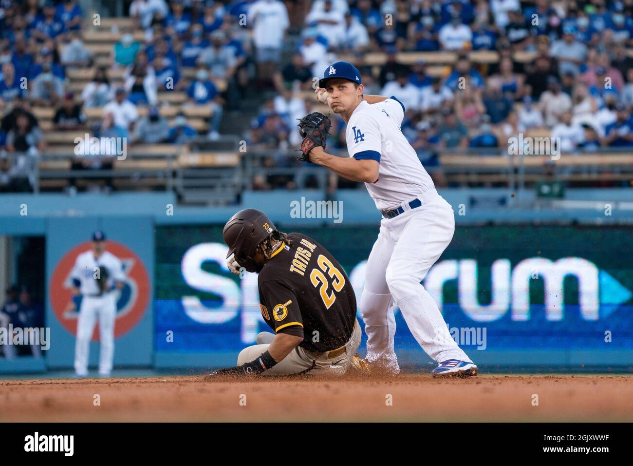 Los Angeles Dodgers shortstop Corey Seager (5) throws to first base to