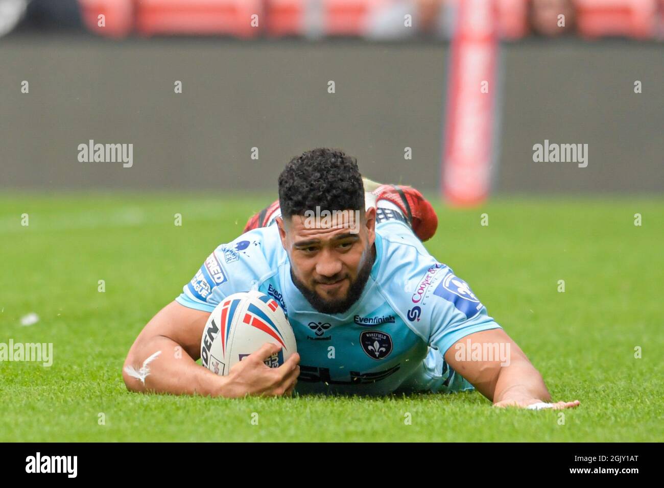 Kelepi Tanginoa (12) of Wakefield Trinity goes over for a try to make it 10-10 in Leigh, United Kingdom on 9/12/2021. (Photo by Simon Whitehead/News Images/Sipa USA) Stock Photo