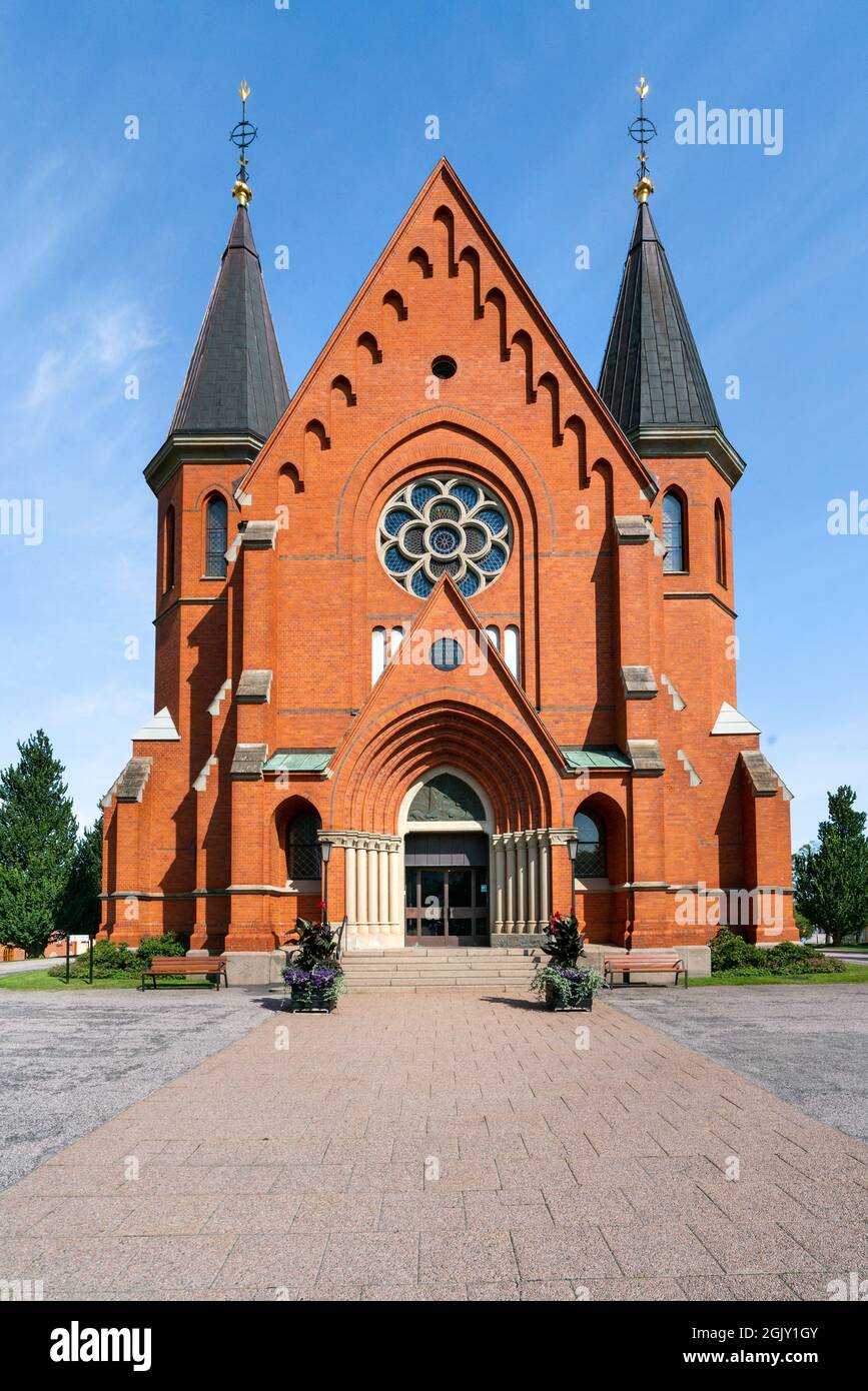 Red brick building of the Sankt Petri Kyrka, or Saint Peter Church, in Vastervik, Sweden, on a sunny summer day. Stock Photo