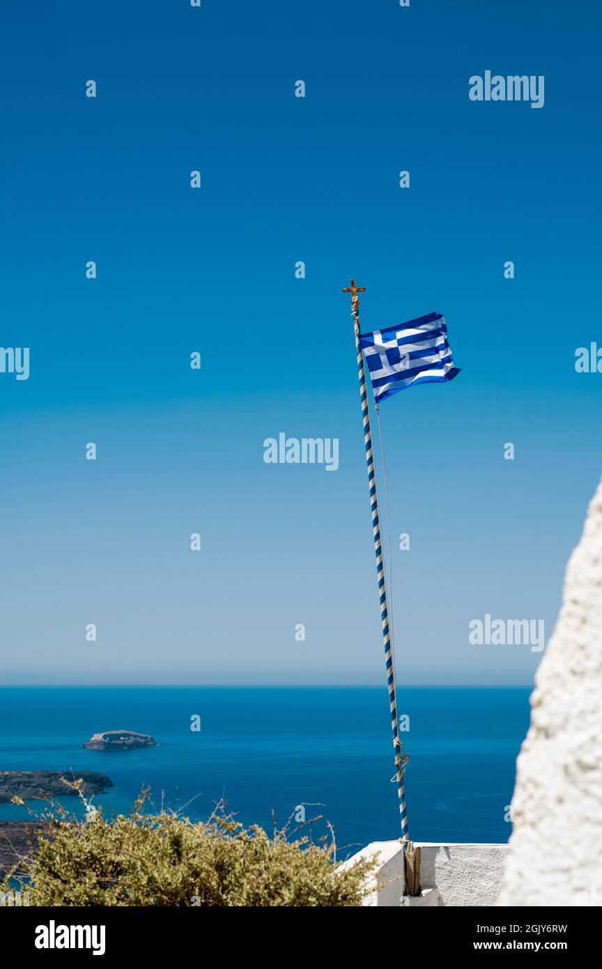 Flag of Greece with cross Aegean sea and blue sky on background