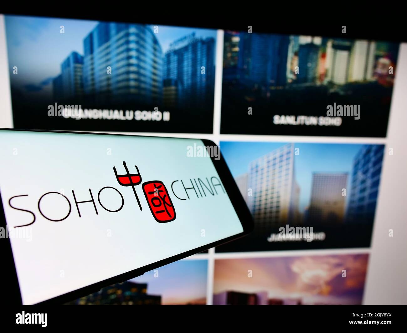 Smartphone with logo of Chinese real estate company SOHO China Ltd. on