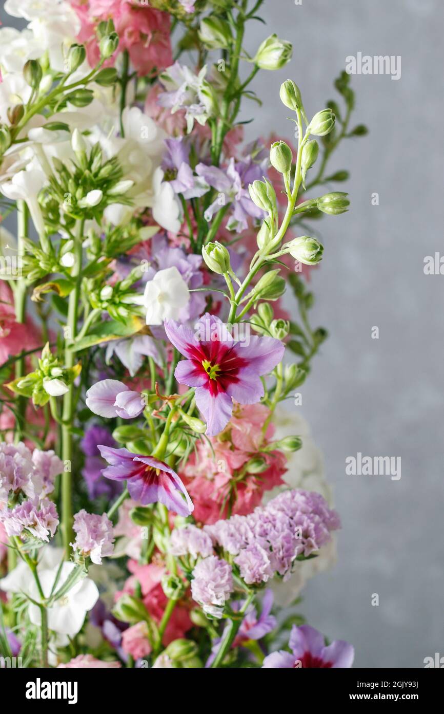 Floral arrangement with phlox and leucocoryne flowers. Home decor Stock Photo