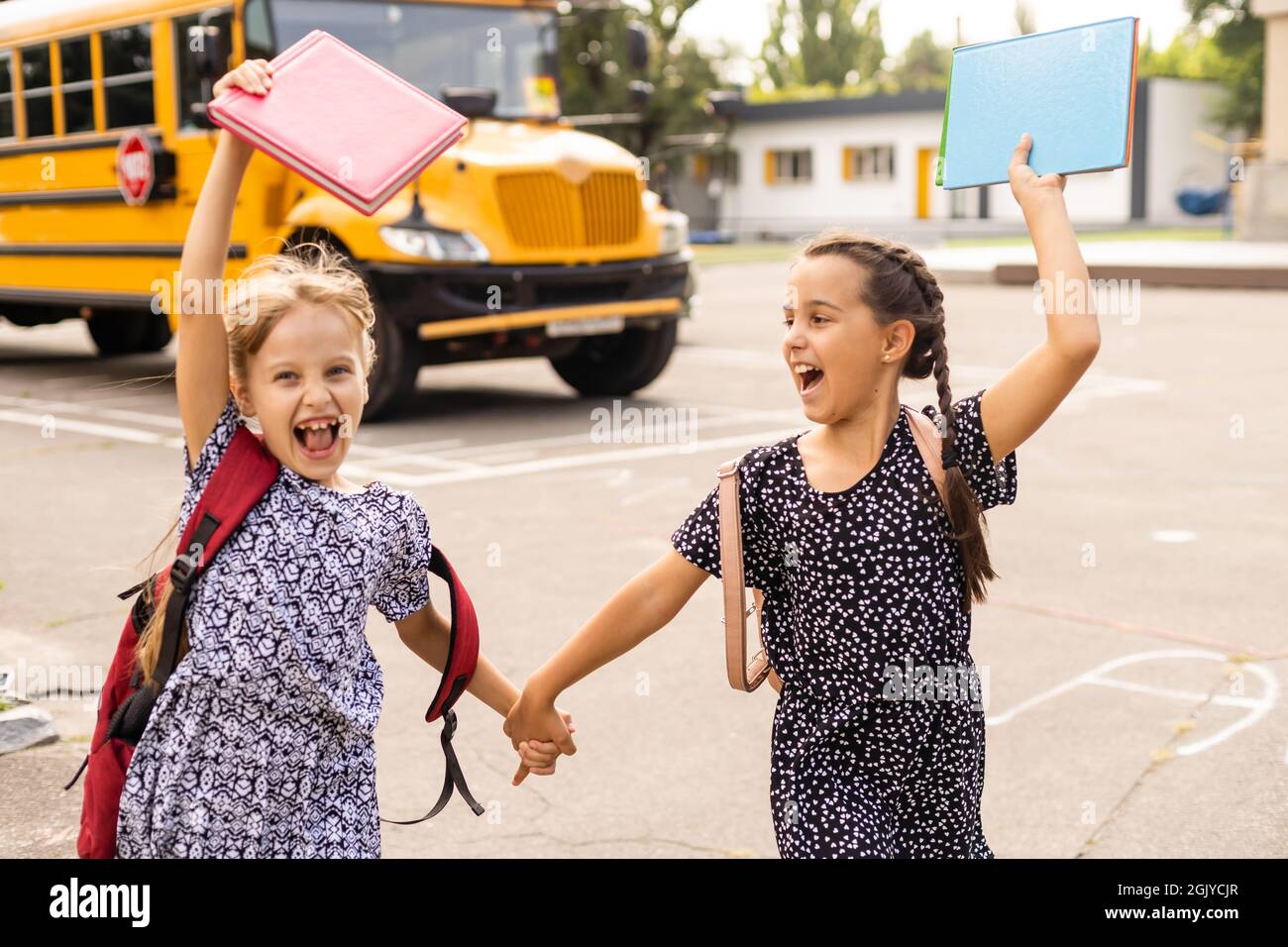 Happy Schoolgirls outdoor. Back to School Stock Photo - Alamy